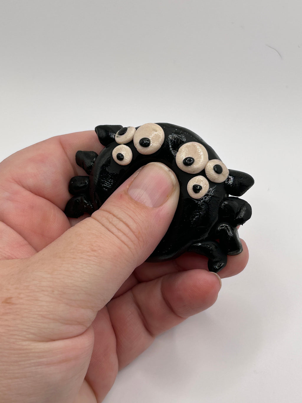 polymer clay spider worry stone