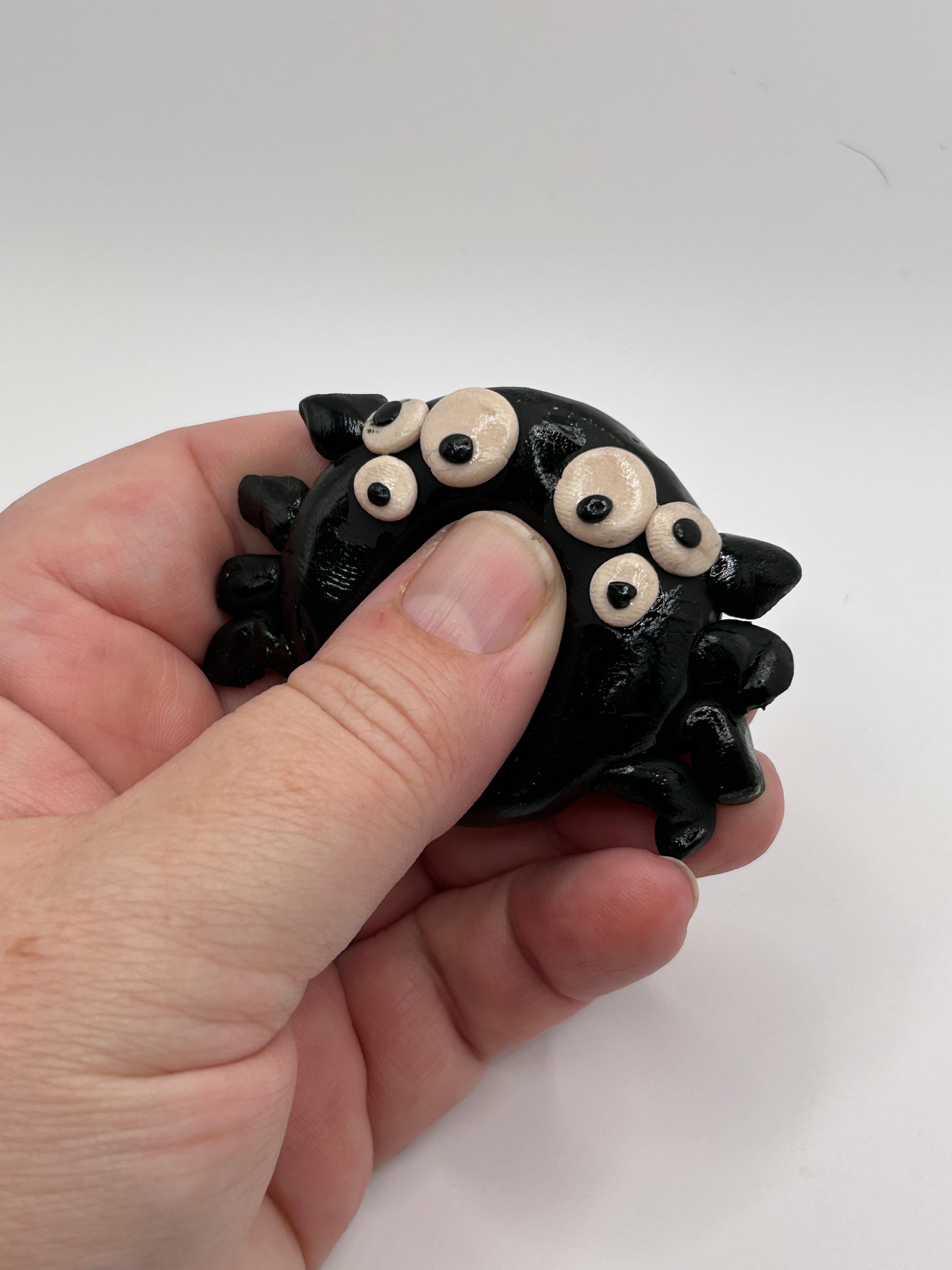 polymer clay spider worry stone